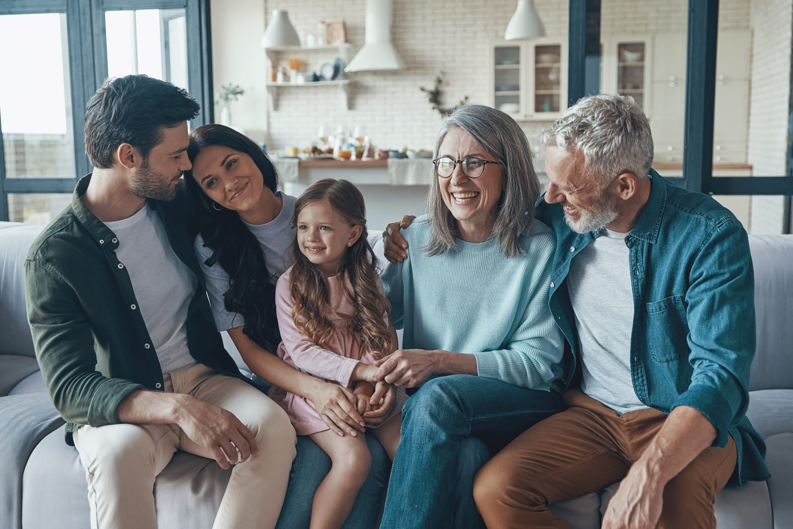 Family relaxing together and smiling